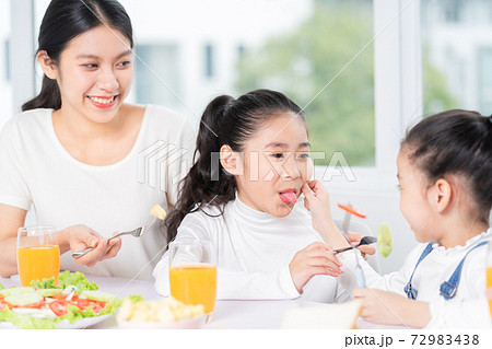 Family eating breakfast Family eating breakfast 72983438