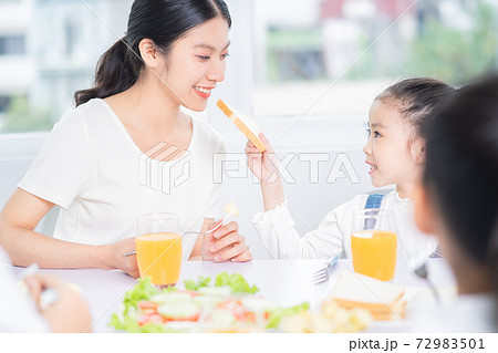 Family eating breakfast Family eating breakfast 72983501