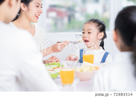 Family eating breakfast Family eating breakfast 72983514