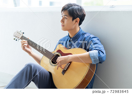 Man guitarist Man guitarist 72983645