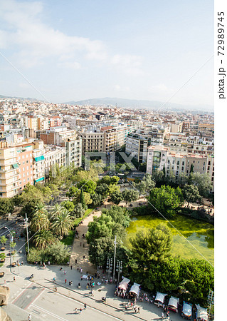 スペインバルセロナのサグラダファミリアの窓から見えるバルセロナの街並みの写真素材