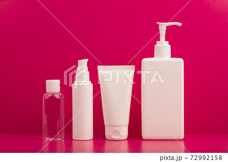 Set of cosmetic products for skin care on bright pink background 72992158