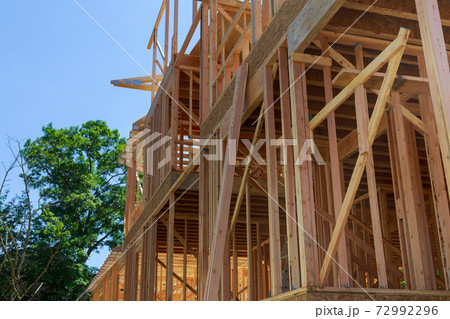 New home construction framing of a house under construction New home construction framing of a house under construction 72992296