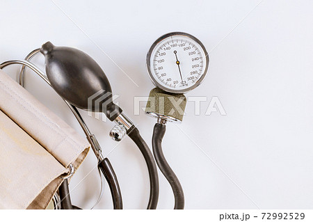 Mechanical tonometer closeup medical device on a white background Mechanical tonometer closeup medical device on a white background 72992529