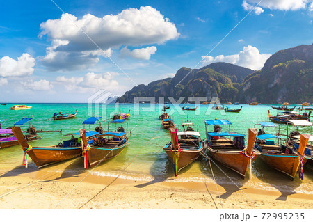 Traditional thai boat on Phi Phi Don Traditional thai boat on Phi Phi Don 72995235