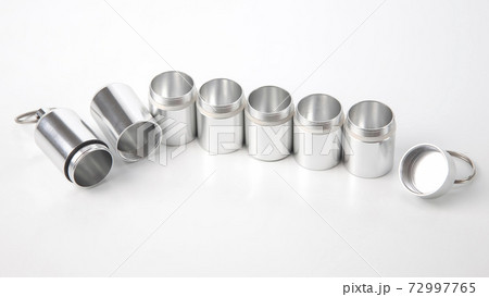 sealed aluminum containers for small items and medical pills on a white background sealed aluminum containers for small items and medical pills on a white background 72997765