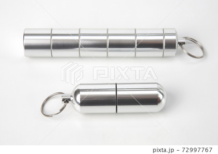 sealed aluminum containers for small items and medical pills on a white background sealed aluminum containers for small items and medical pills on a white background 72997767