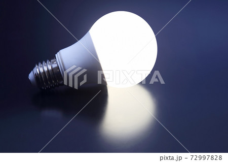 modern led lamp is turned on a dark background 72997828