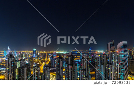 Panorama of Dubai at night 72998535
