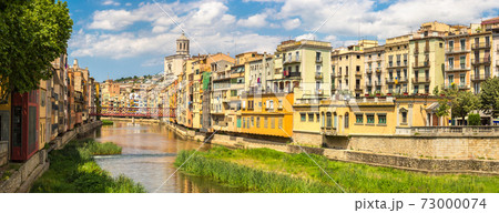 Colorful houses and Eiffel bridge in Girona Colorful houses and Eiffel bridge in Girona 73000074