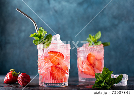 strawberry alcoholic cocktail with fresh mint strawberry alcoholic cocktail with fresh mint 73007345