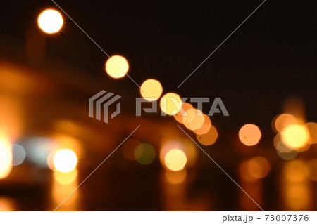 blurry light of building on river background and texture blurry light of building on river background and texture 73007376