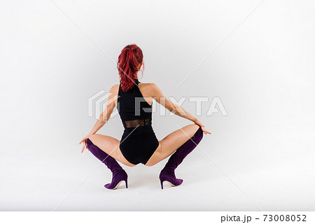Sexy pole redhead dancer showing her body. 73008052