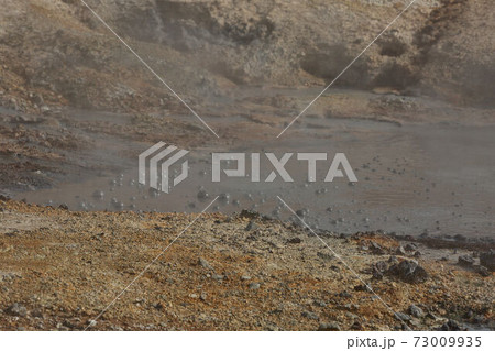A close-up of a mud pot in Seltun Geothermal area of Krysuvik in south Iceland 73009935
