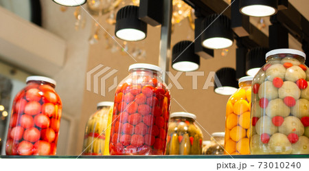 Homemade pickled fermented preserved vegetables in jars Homemade pickled fermented preserved vegetables in jars 73010240