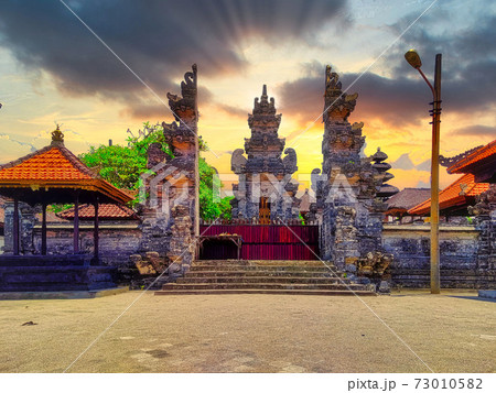 A classical Balinese Candi Bentar in Canguu, Bali, Indonesia A classical Balinese Candi Bentar in Canguu, Bali, Indonesia 73010582