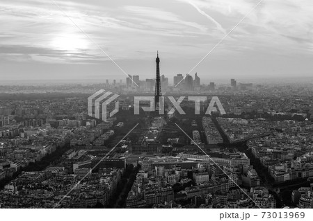 Aerial view of Paris with Eiffel tower and major business district of La Defence in background at sunset 73013969