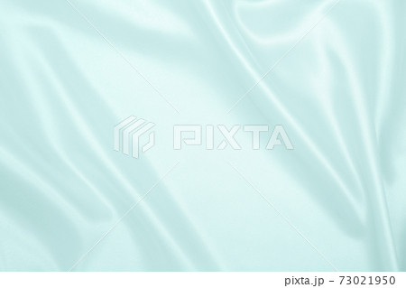 Smooth elegant blue silk or satin luxury cloth texture as abstract background. Luxurious background design Smooth elegant blue silk or satin luxury cloth texture as abstract background. Luxurious background design 73021950