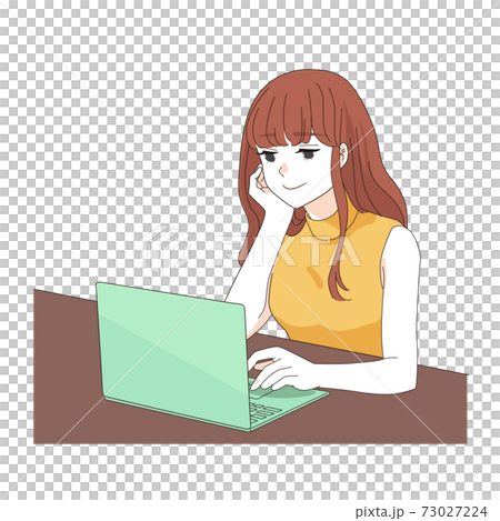 A woman in her twenties operating a laptop 73027224