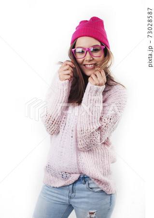 young pretty stylish hipster girl posing emotional isolated on white background happy smiling cool smile, lifestyle people concept 73028587