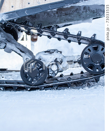 The back of the snowmobile in winter. Riding in the snow 73033535