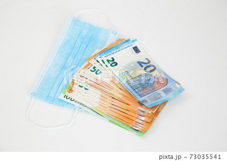 Concept of financial costs of coronavirus pandemic 73035541