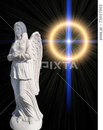 monument an angel on a background of mystical light monument an angel on a background of mystical light 73037003