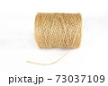 bobbin of yarn on a white background. isolated white background. 73037109