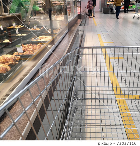 Social distance. Marking on the floor in a store, market, pharmacy 73037116