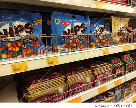 KUALA LUMPUR, MALAYSIA -DECEMBER 2, 2020: Selected focused on the various type and brand of chocolate product packed in the nice packaging and displayed in the supermarket rack for sale.  73037837