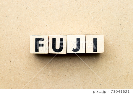 Alphabet letter block in word fuji on wood background 73041621