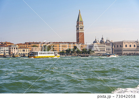 White boat come to Venice Italy in the summer day White boat come to Venice Italy in the summer day 73042058