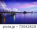 Wooden bridge at dusk 73042628