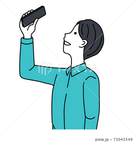 A man taking a picture with a smartphone 73043549