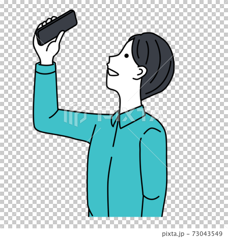 A man taking a picture with a smartphone 73043549