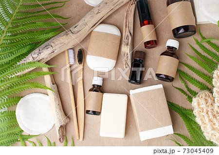 Natural eco bamboo toothbrush, coconut soap, solid shampoo, , bathroom essentials in sustainable lifestyle. zero waste concept, self-care focused background, mock up, copy space, banner Natural eco bamboo toothbrush, coconut soap, solid shampoo, , bathroom essentials in sustainable lifestyle. zero waste concept, self-care focused background, mock up, copy space, banner 73045409