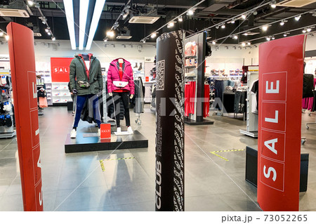 Sankt-Peterburg, 12 24 2020 Seasonal sale in the shop, clothers for sport 73052265