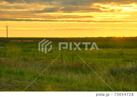Sunset on the road to Blagoveshchensk. Sunset on the road to Blagoveshchensk. 73054728