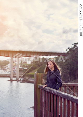Young woman on the Ribadeo lookout bridge 73055372