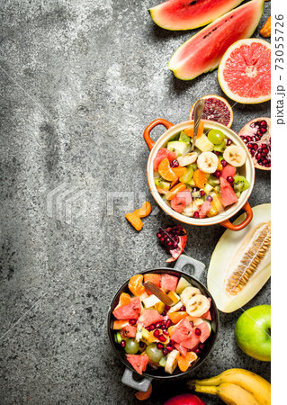 Tropical food . Fresh tropical fruit salad in bowls. 73055726
