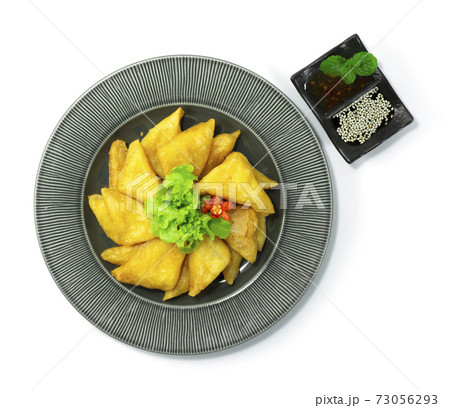 Burmese Chickpea Tofu  Deep Fried Served with Nut Dipping Sauce 73056293