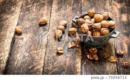 Walnuts in a bowl. Walnuts in a bowl. 73056713