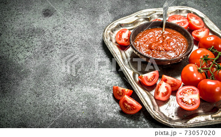 Fresh tomato sauce with spices. Fresh tomato sauce with spices. 73057020
