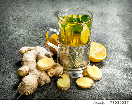Ginger tea with mint and honey. Ginger tea with mint and honey. 73059057