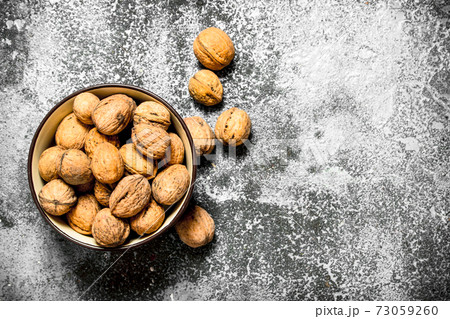 Walnuts in a bowl. Walnuts in a bowl. 73059260