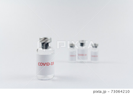 Corona virus vaccine in bottles on white background, COVID19 Corona virus vaccine in bottles on white background, COVID19 73064210