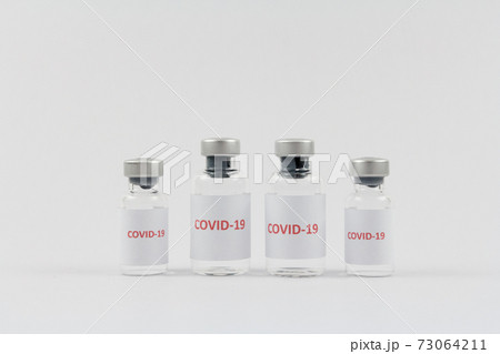 Corona virus vaccine in bottles on white background, COVID19 Corona virus vaccine in bottles on white background, COVID19 73064211