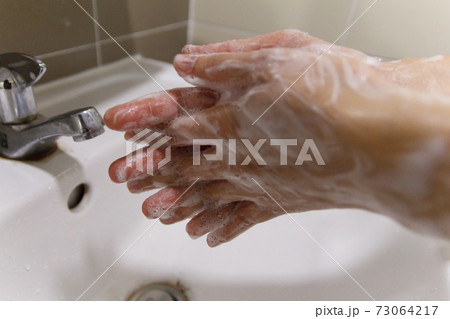 Washing hands rubbing with soap for corona virus prevention. Health care 73064217