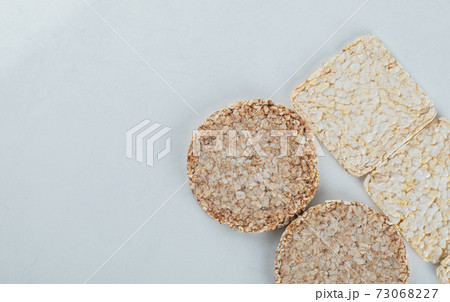 Two types of crispbread on white background 73068227