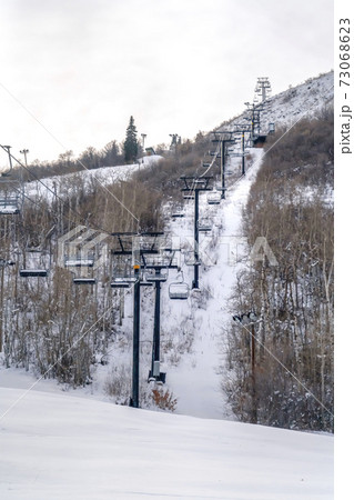 Ski lifts over snowy mountain in Park City Utah Ski lifts over snowy mountain in Park City Utah 73068623